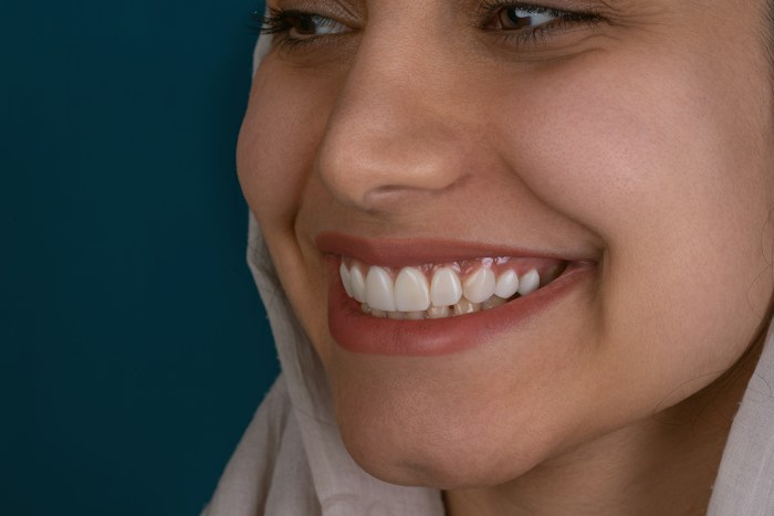 Illustrative portrait for fictional dentist Dr Maya Ellis